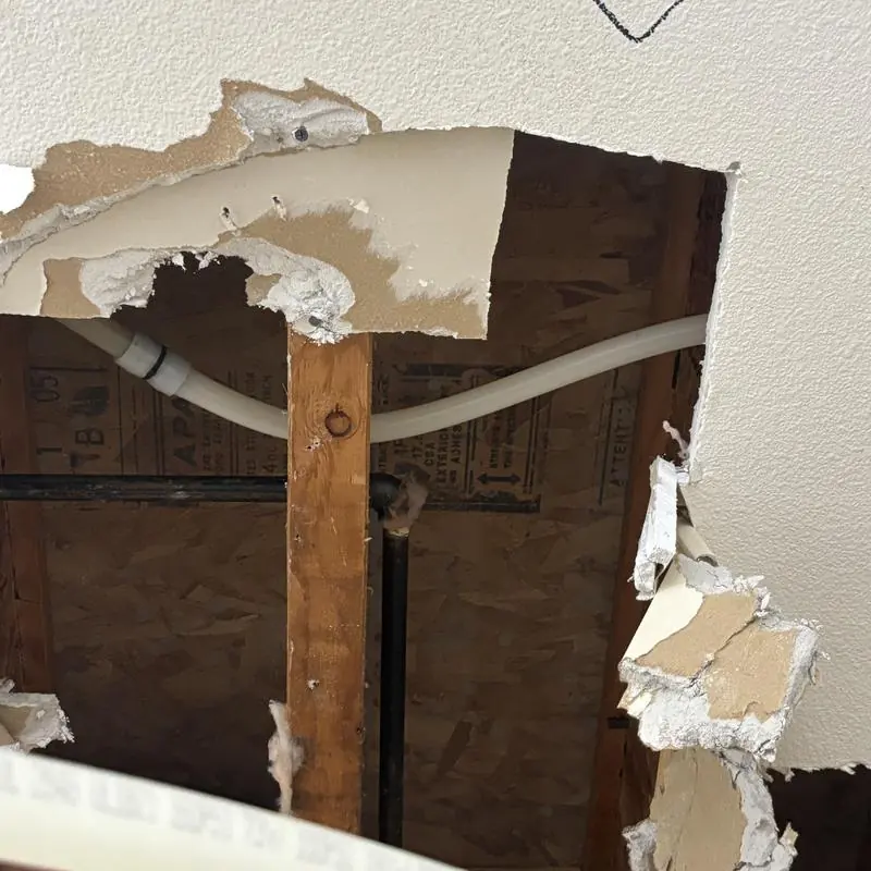 PEX water line cracked behind ceiling drywall damage